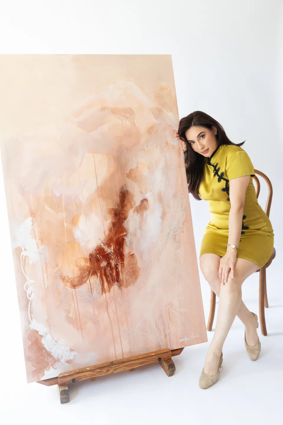 Studio portrait on a painted backdrop